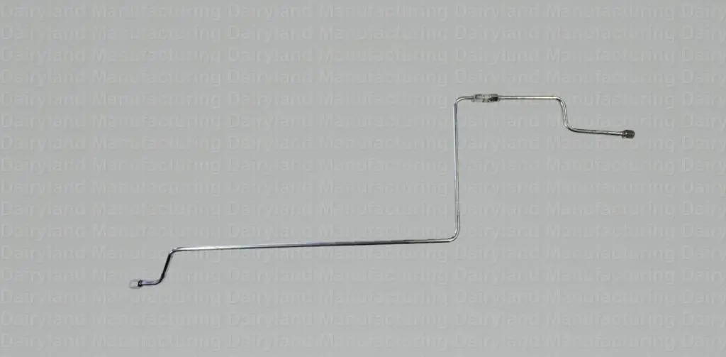 A metal rod hanging on a gray background.