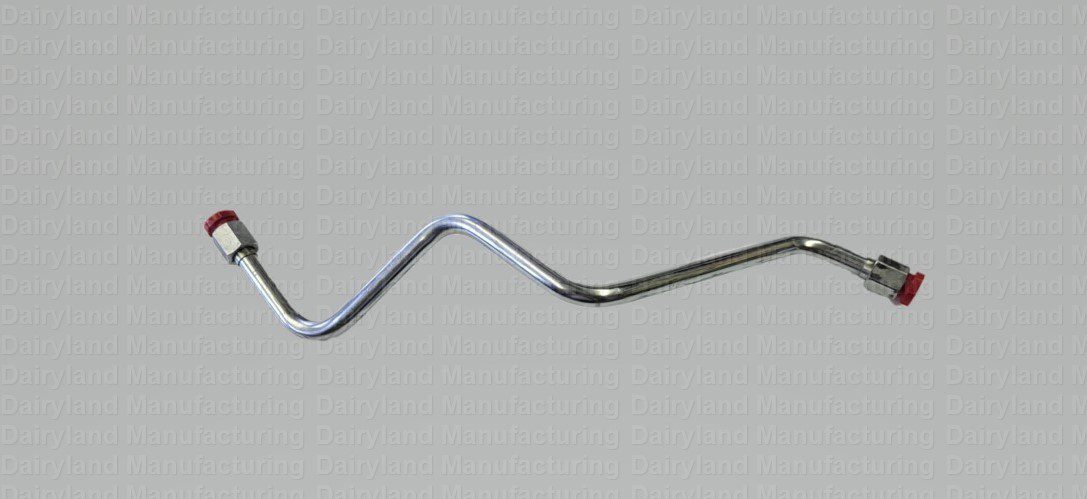 A stainless steel wavy handle on a gray background.